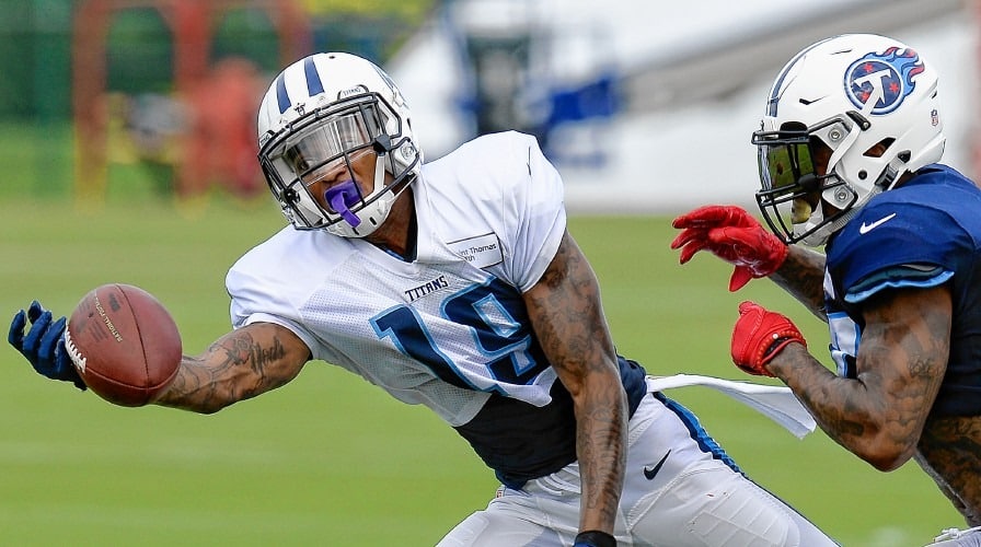Tennessee Titans wide receiver Tajae Sharpe reaching for a ball during practice. (AP Photo/Mark Zaleski)